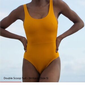 Left on Friday 24 Karat Women's Double Scoop One Piece Swimsuit